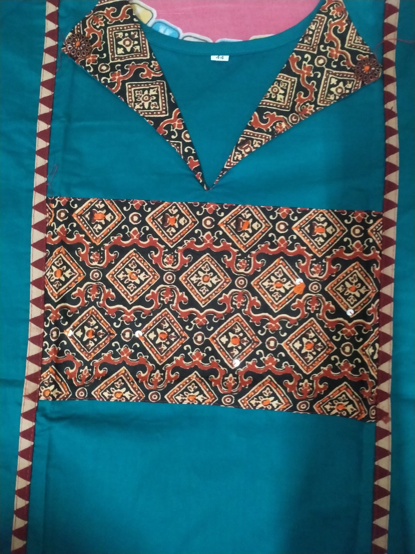 teal blue tunic